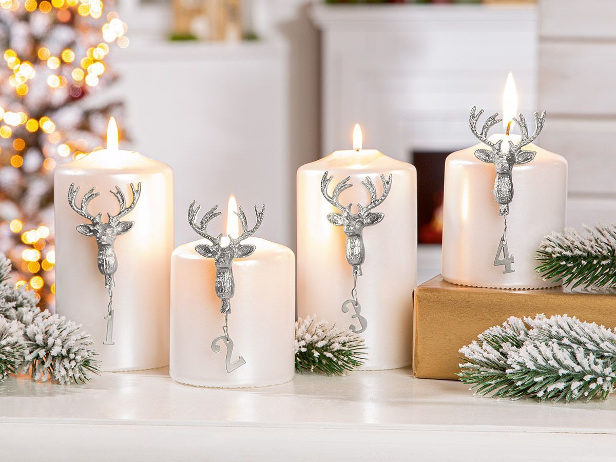 Kerzenstecker Rentier 4tlg.