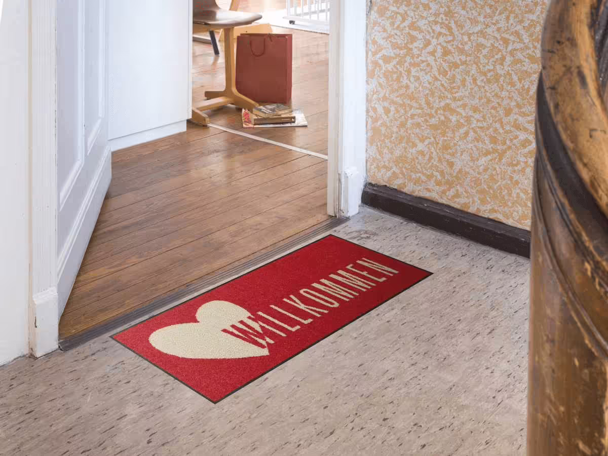 sld2403-030x075_herzlichst_rot-2_n_m1 Wohnmatte Herzlich Rot